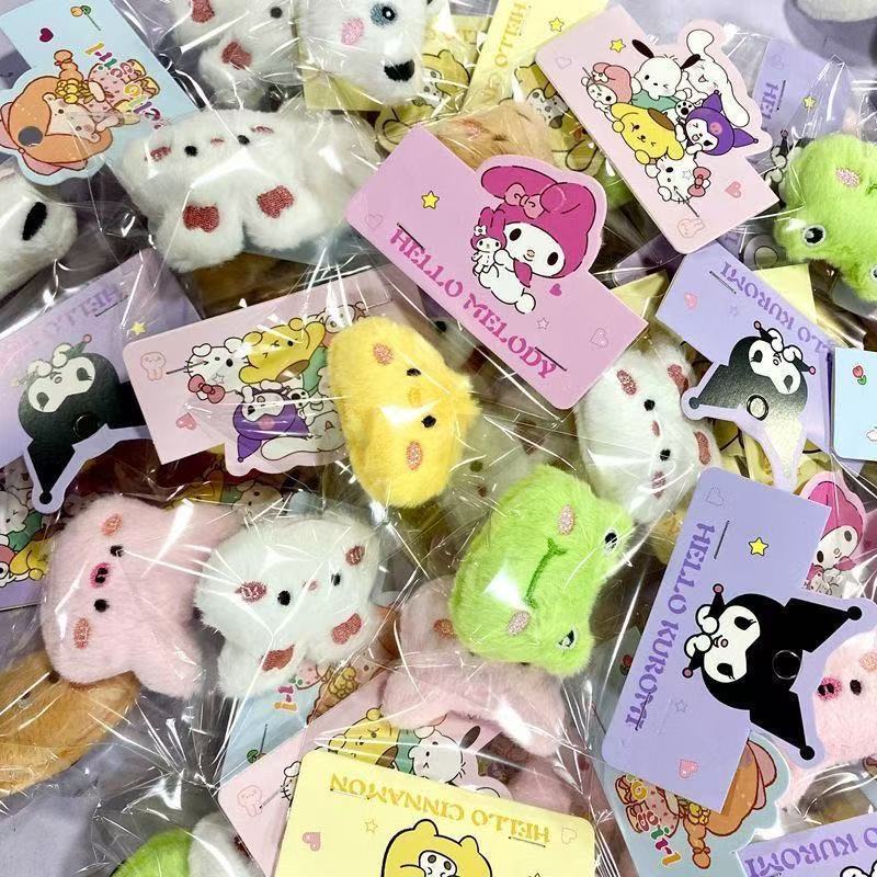 Colorful plush doll keychains featuring cute animal designs and tags, perfect for collectors and fans.