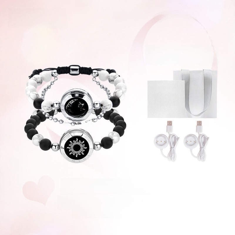 A pair of beaded sun and moon couple bracelets