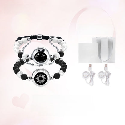 A pair of beaded sun and moon couple bracelets